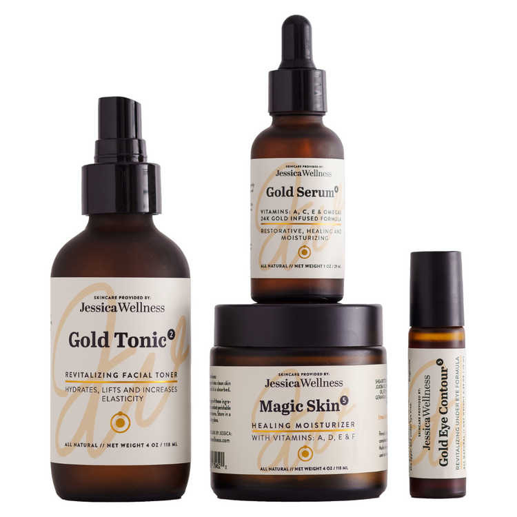 Gold beauty line line up, showing gold tonic, magic skin, gold serum and gold eye contour. All in amber glass bottles